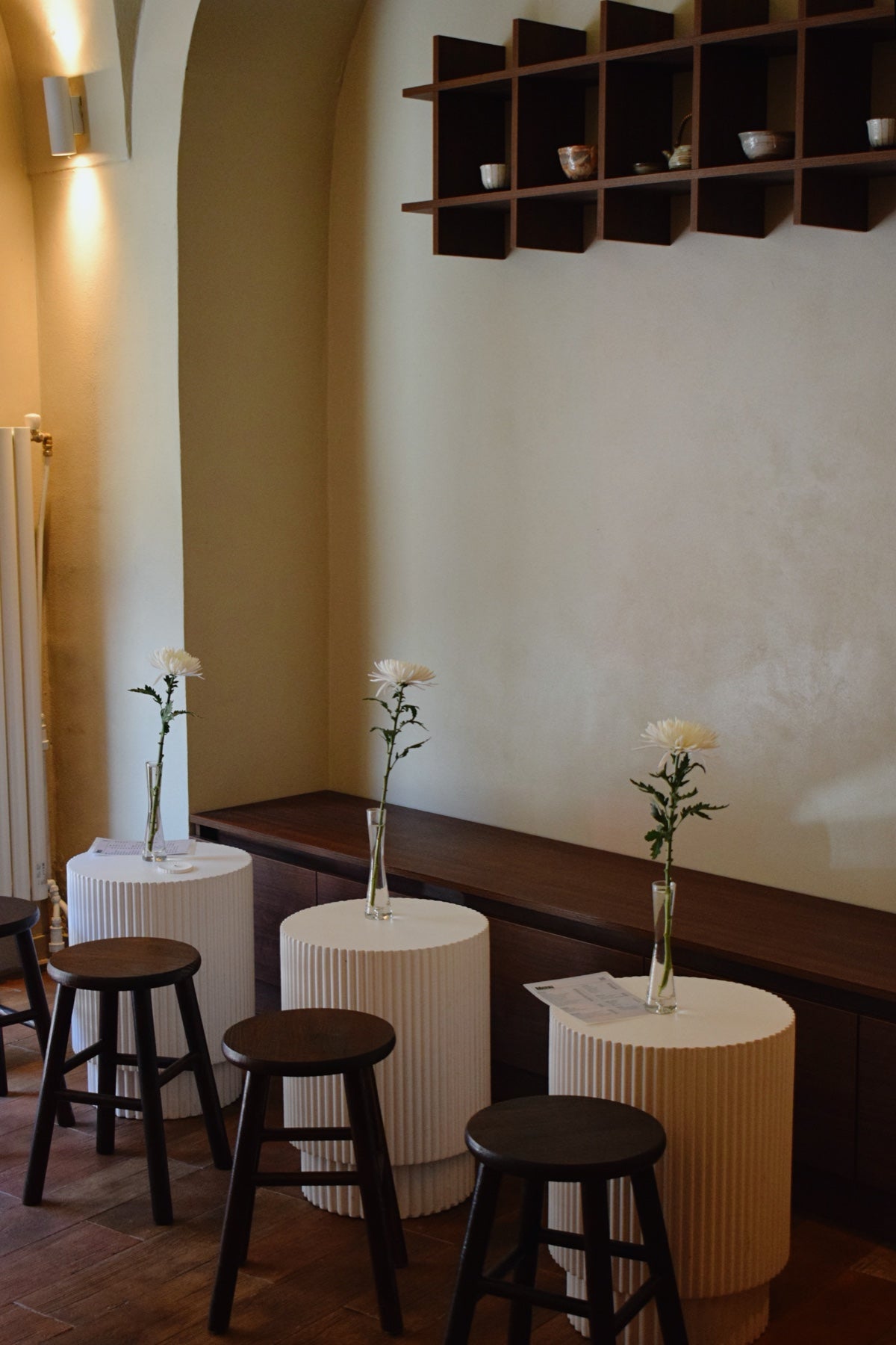 Stools beneath the vaulted ceiling